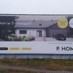 Baner na elewacji Suchy Las